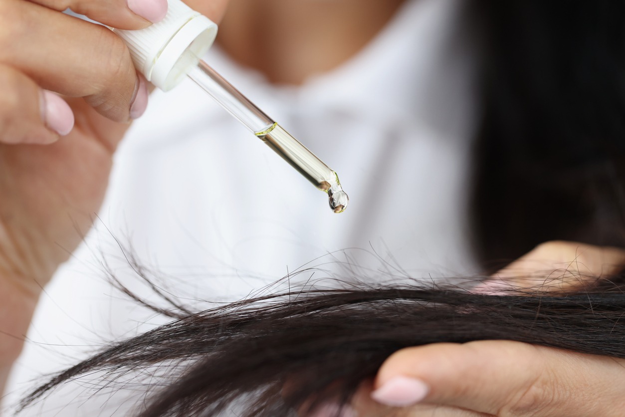 Adding hair with serum for shine